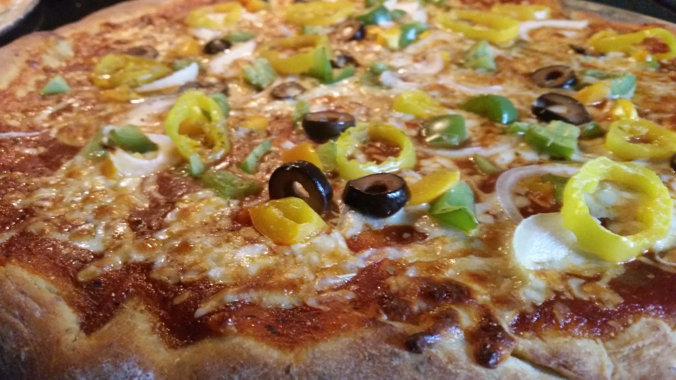 The Coveted 'Hand Tossed' Pizza 1