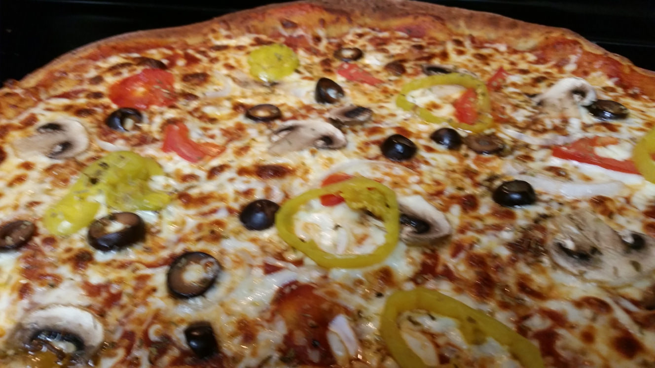 The Coveted 'Hand Tossed' Pizza 5