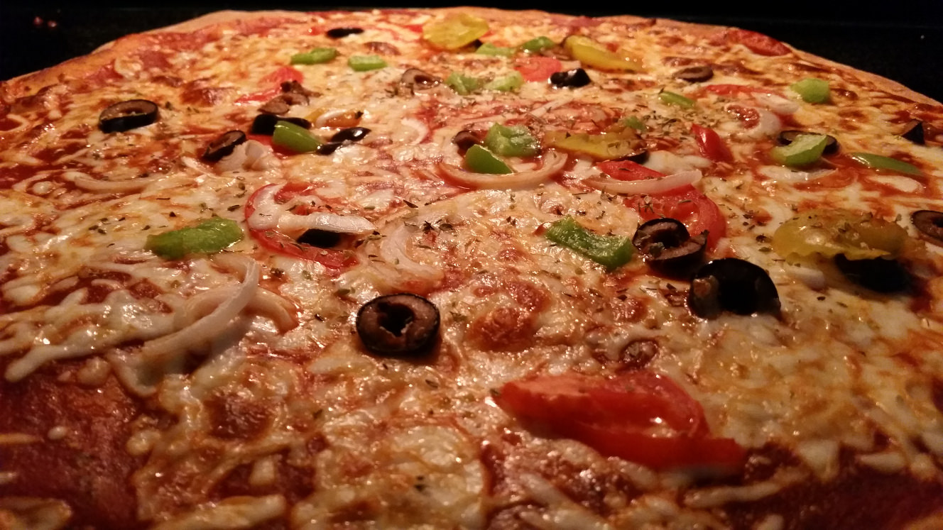 The Coveted 'Hand Tossed' Pizza 6